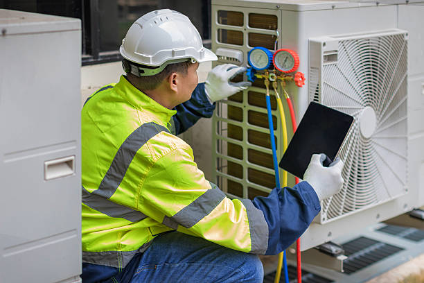 Professional Hvac technician working in Tuttle, OK